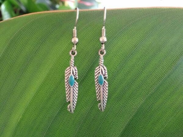 Native_American_Silver_Feather_Earrings_with_Blue_Turquoise_Sharp_Oval_Shape_Mark Native American Silver Feather Earrings