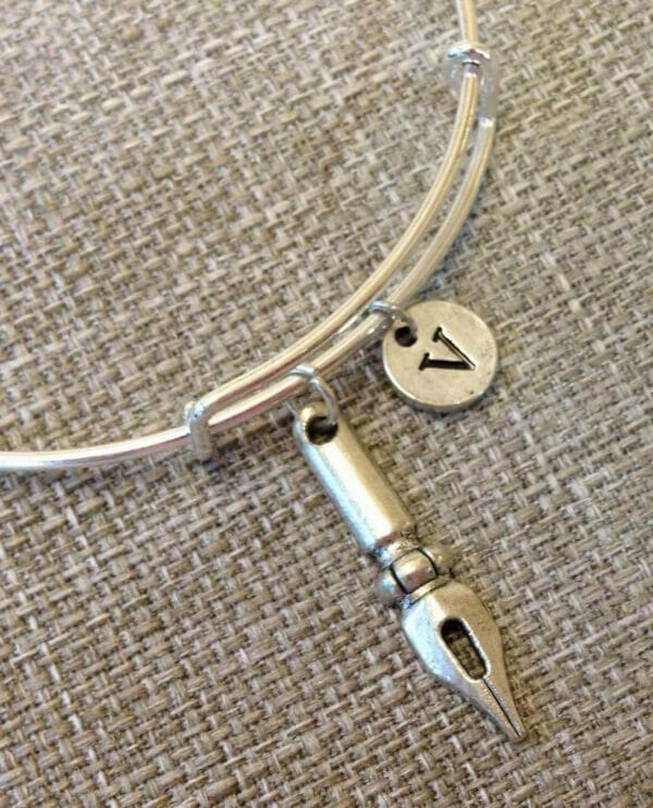 alex_and_ani_bangle Writer, author Charm Bangle Bracelets