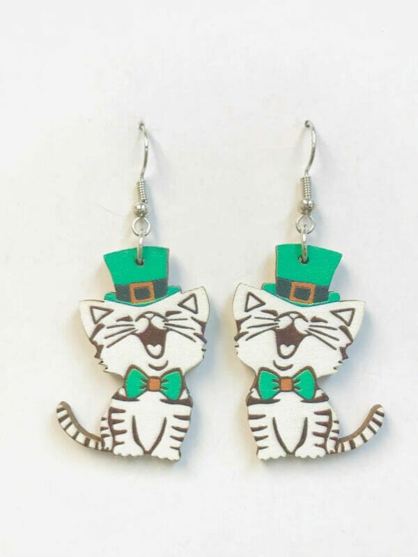 greenhatcatdancingwithbigsmailestatmentearrings green hat cat Earrings